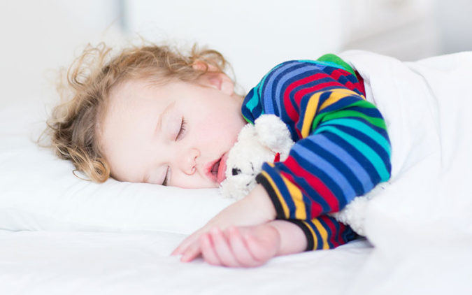 Toddler Sleeping in Bed