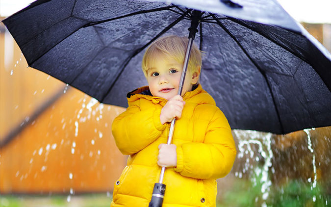 Preschool Student with Umbrella